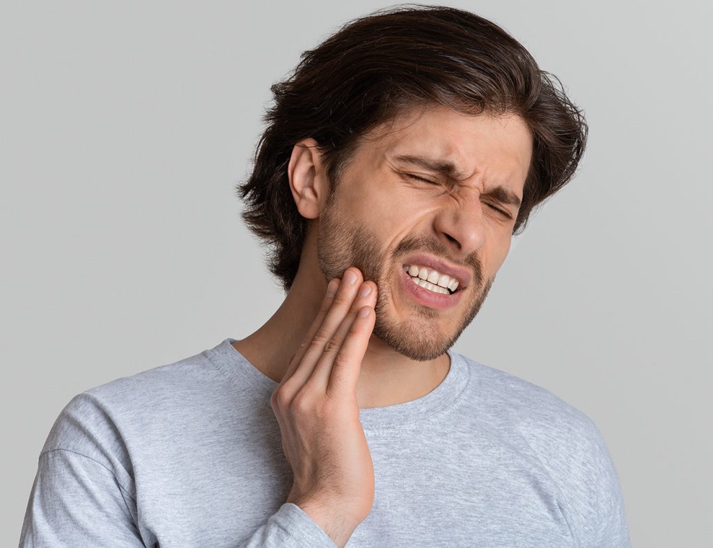 3d render of jaw with dental implant isolated over white background